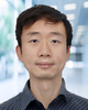 GMU assistant professor Mingkui Wei wears a dark-gray shirt in his faculty profile